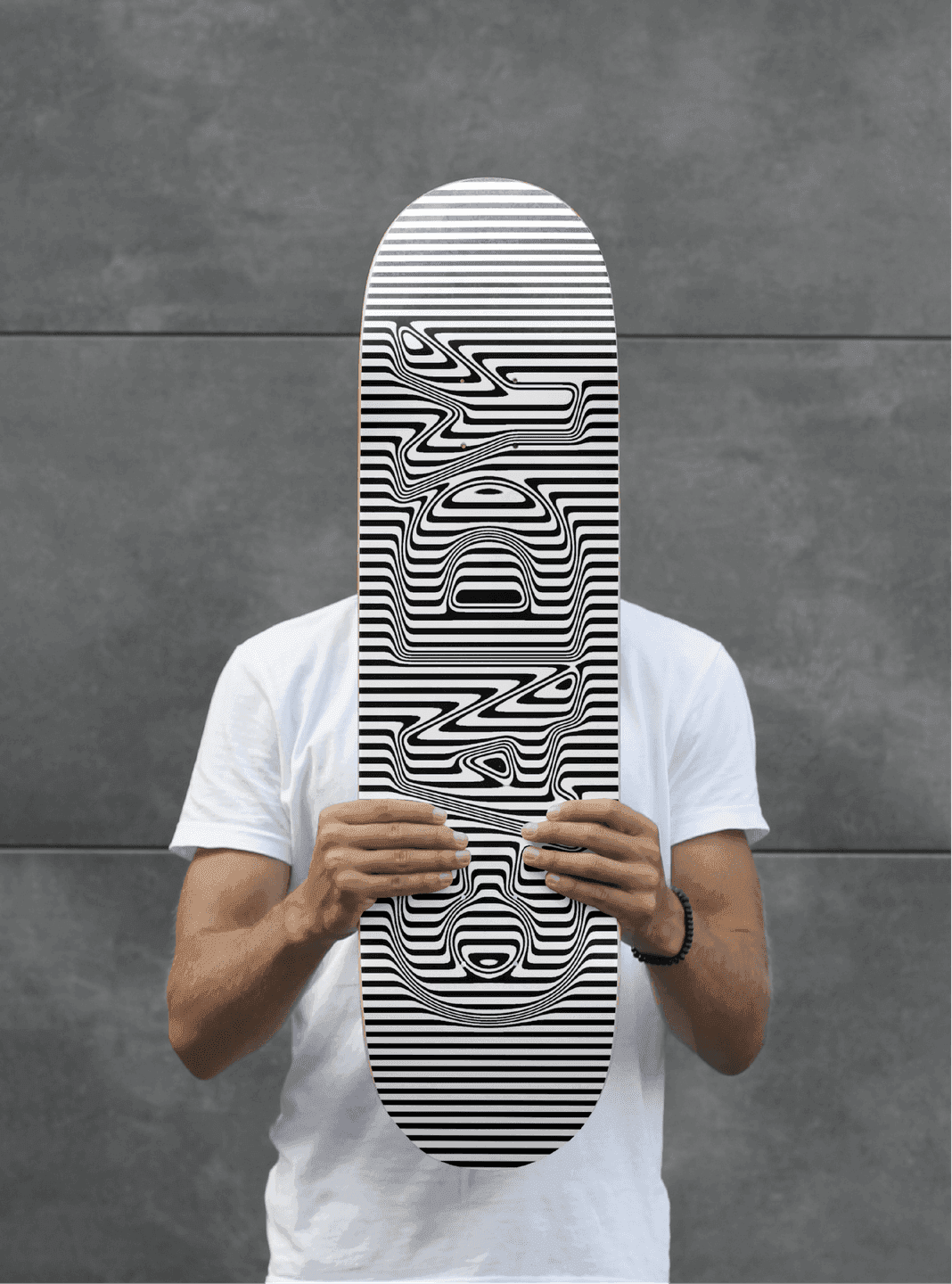 CADY Skateboard. A black-and-white striped skateboard featuring an optical, distorted CADY logotype.