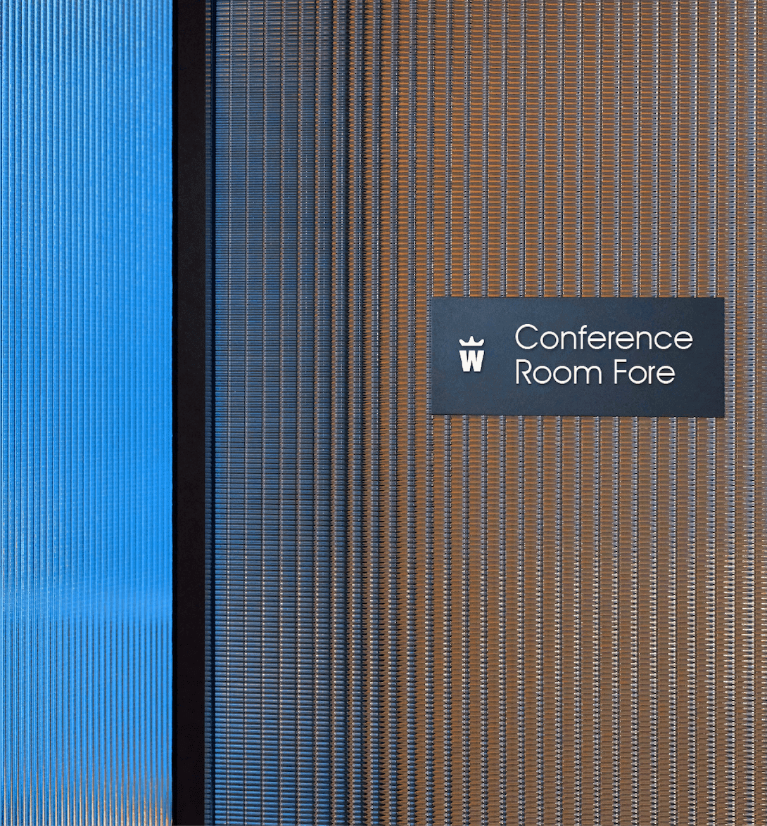 Wayfinding Sign. Office signage using the monogram to brand WHOOSH conference spaces.